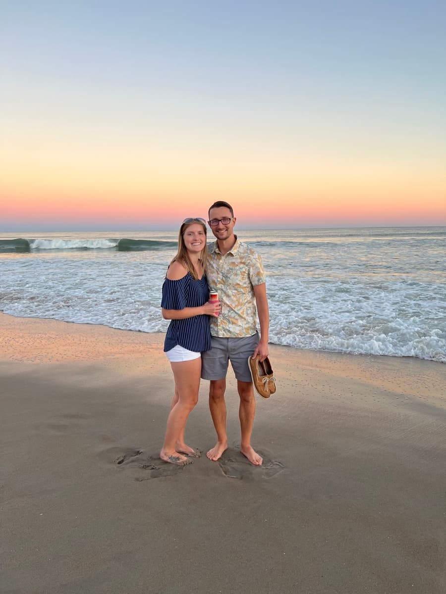 Dmitri and Victoria together on the beach at sunset